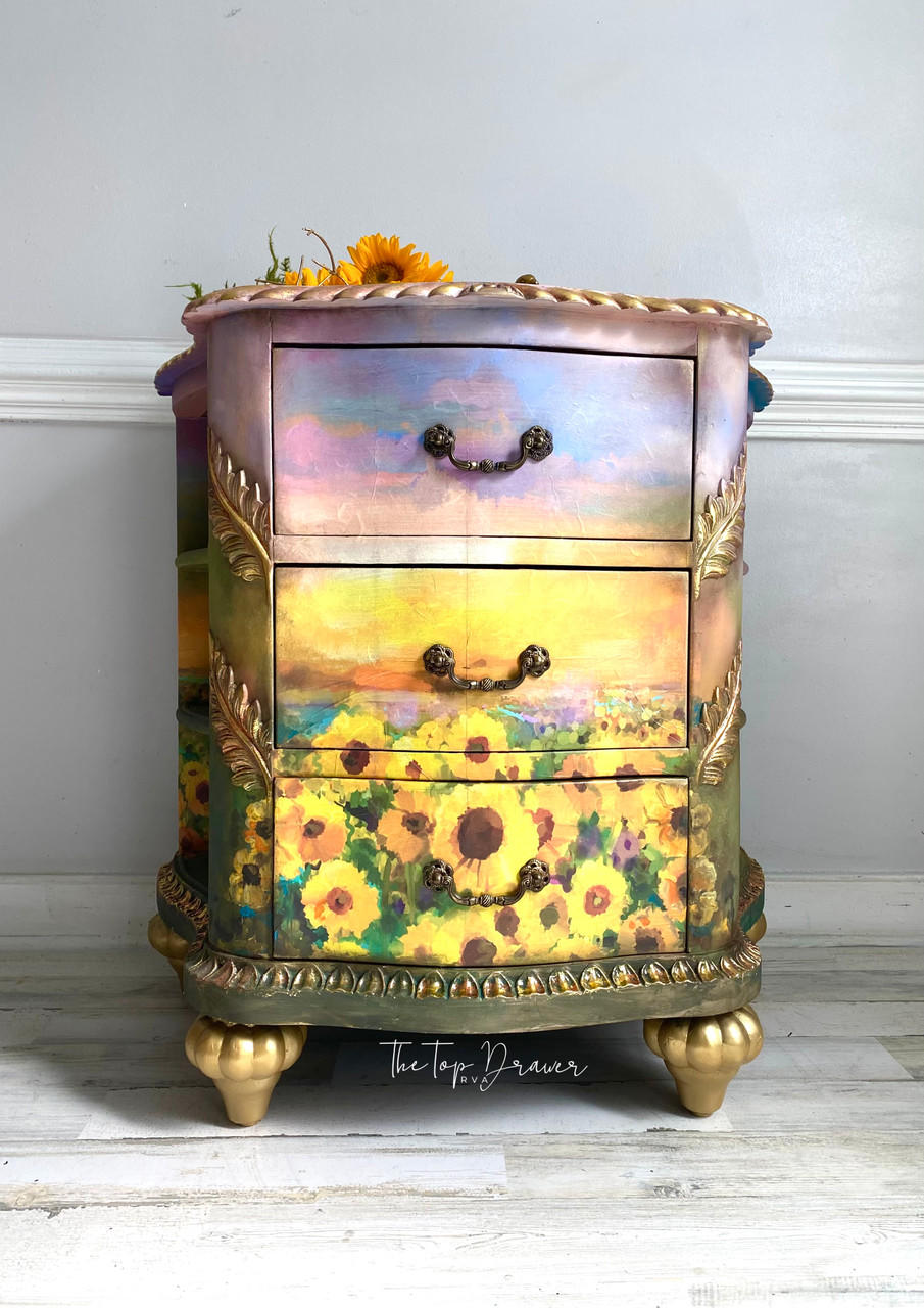 Belles and Whistles Sunflower Sunset - A1 Rice Decoupage Paper , three drawer side table with the sunflower sunset rice decoupage paper on the front. staged with sunflowers on top