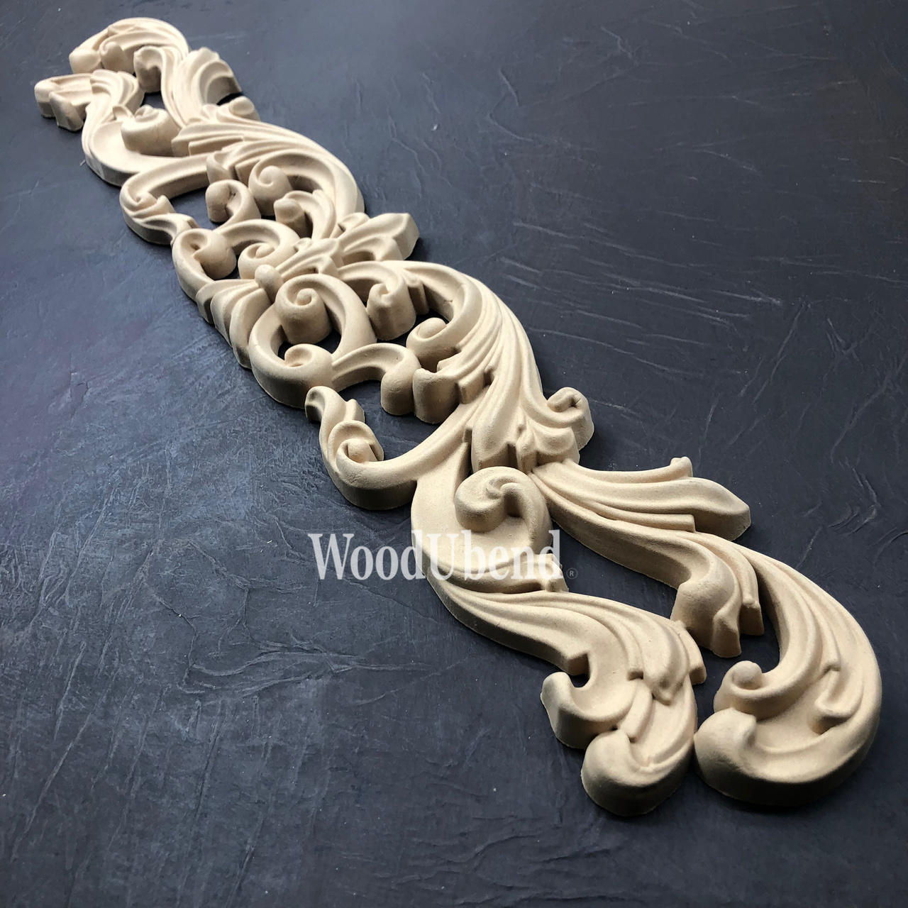 WoodUBend Applique #6035 is the perfect mouldable embellishment for any project!
Applique #6035 against a black background.