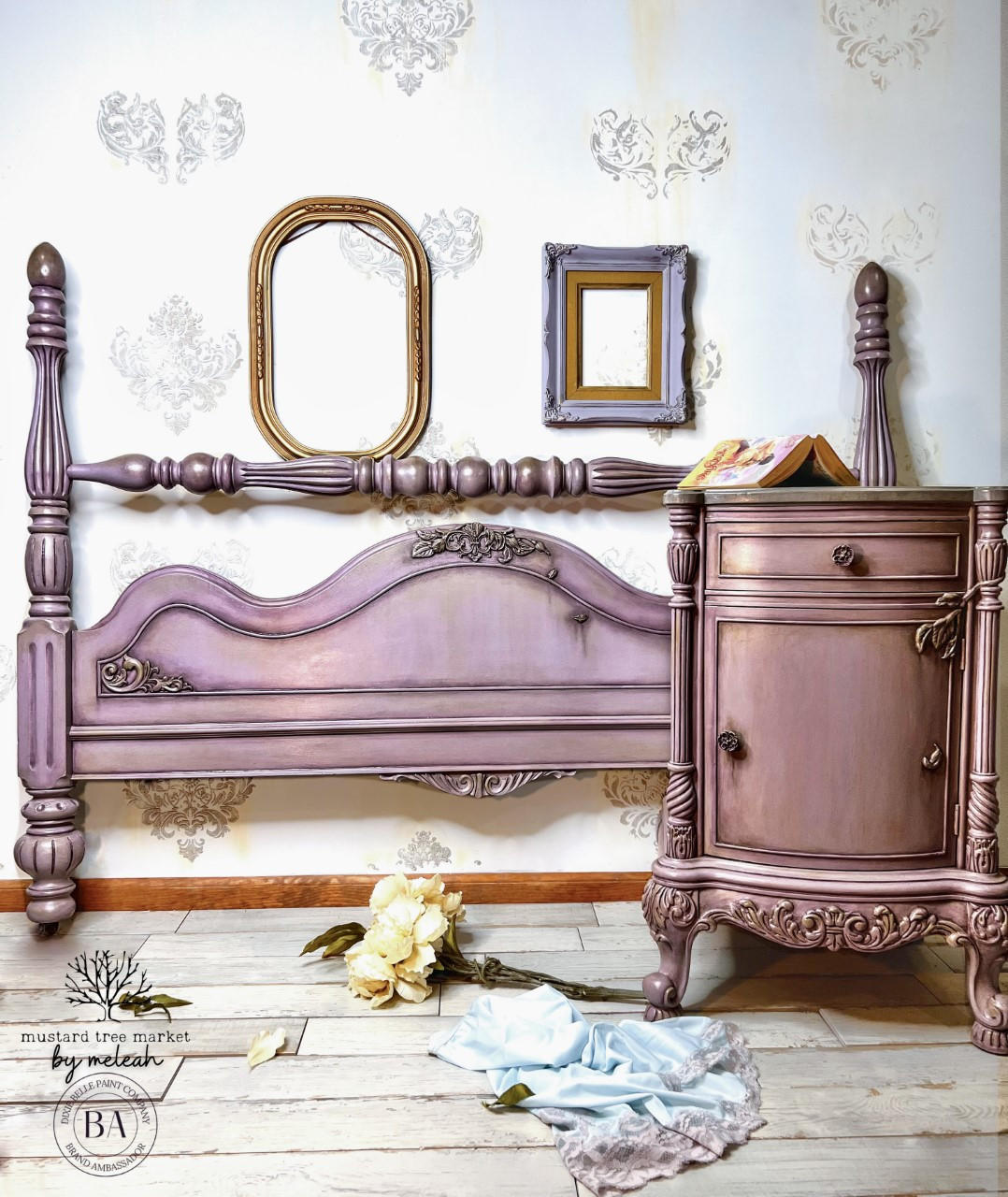 WoodUBend Corner Applique #2093 (set of 2)
There is a night table and a headboard painted rose and lavender and antiqued. There are ornate appliques on the bottom of the night table. There are two picture frames hanging on the back wall that is white and yellow. A bouquet of pale, yellow flowers lay on the whitewashed wood floor. In front of the flowers is a light blue skirt tossed on the floor.