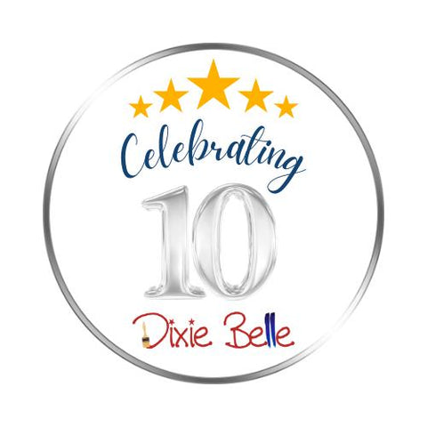 This is a logo for Dixie Belle 10 year anniversary with 5 gold stars, Dixie Belle and a silver number 10