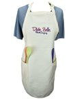 Dixie Belle Paint Dixie Belle Paint Company Apron
Image of Dixie Belle Paint Company Apron ona blue shirt on a white background.