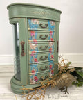 Jewelry Box chalk painted with Weeping Willow chalk paint adorned with gilded age rub on transfer, decorated with a bird in front, gold twigs and greenery