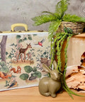 Belles and Whistles Woodland Nursery - A1 Rice Decoupage Paper.  Suitcase with Woodland Decoupage Rice paper applied with olive green rabbit and plant for staging