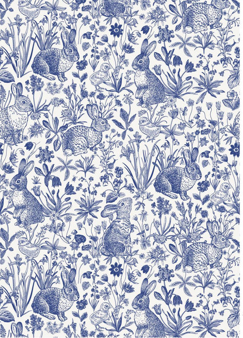 Blue and white toile pattern featuring rabbits, birds, and snails among wildflowers and grass, creating a delicate and detailed nature scene.