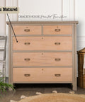 A wooden chest of drawers with a natural finish stands against a white wall. It has three large drawers and two small top drawers. A woven basket is next to it on the right, and a chair is on the left. Text on the image reads: "Gracie's House Painted Furniture."