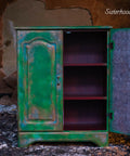 Belles and Whistles Ancient Mud Cloth - A1 Rice Decoupage Paper is a simple way to visually enhance any surface of your project! Green patina style cabinet with one door open. The open door inside is finished with the Ancient Mud Cloth decoupage.