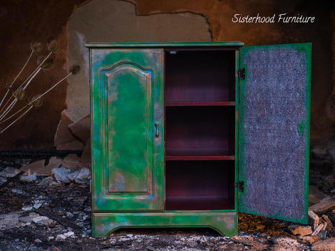 Belles and Whistles Ancient Mud Cloth - A1 Rice Decoupage Paper is a simple way to visually enhance any surface of your project! Green patina style cabinet with one door open. The open door inside is finished with the Ancient Mud Cloth decoupage.