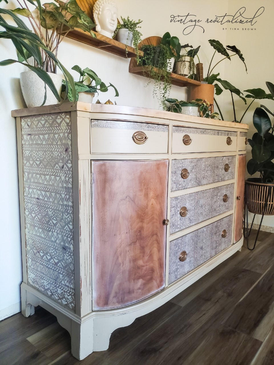 Belles and Whistles Ancient Mud Cloth - A1 Rice Decoupage Paper is a simple way to visually enhance any surface of your project! Distressed tan dresser with natural wood door cabinets. The sides of the dresser are finished with the Ancient Mud Cloth decoupage and the piece is staged with various plant arrangements.