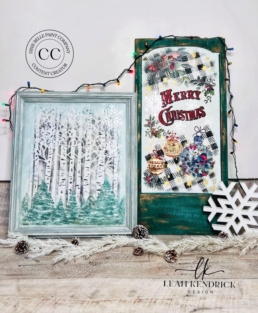 Belles and Whistles Birchwood - Stencil provides an extra decorative touch to any project! Picture frame with Birchwood - Stencil inside with pine trees painted In front. Staged next to green board with "MERRY CHRISTMAS " and ornaments around the words painted on. Christmas lights hang around both piece and pinecones lay in front of pieces.