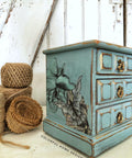 Belles and Whistles Blue and Yellow Floral - Rice Decoupage Paper is a simple way to visually enhance any surface of your project!  Vintage jewelry box painted with Chalk Mineral Paint vintage duck egg Decoupaged with Belles & Whistles Blue and yellow Floral rice paper on the side. Staged with twine on the left side.