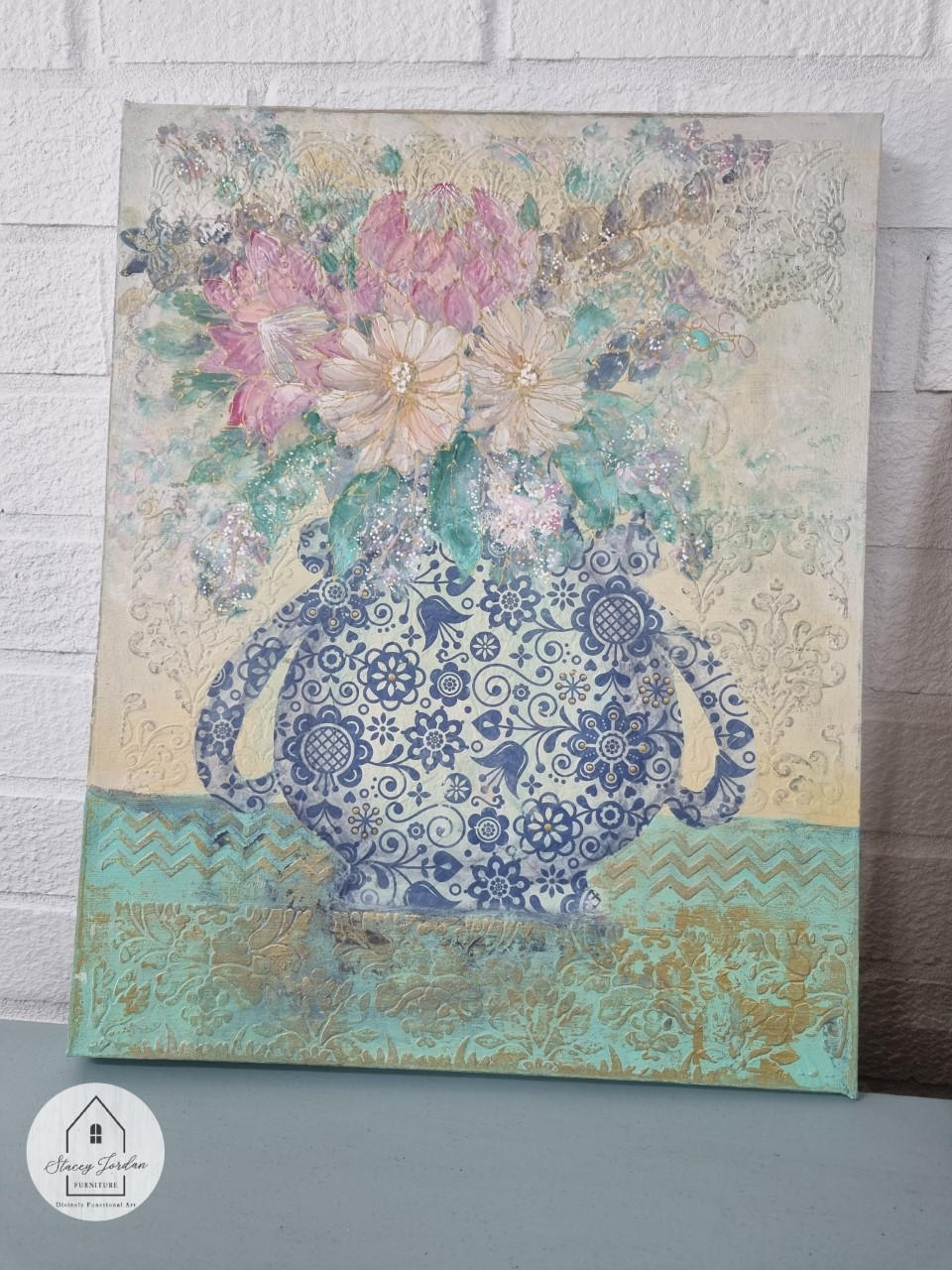 Belles and Whistles Blue Glass Ornate - Rice Decoupage Paper is a simple way to visually enhance any surface of your project! Beautiful painting of a vase using the  Blue Glass Ornate - Rice Decoupage Paper with yellow, pink flowers, and green leaves inside of vase.