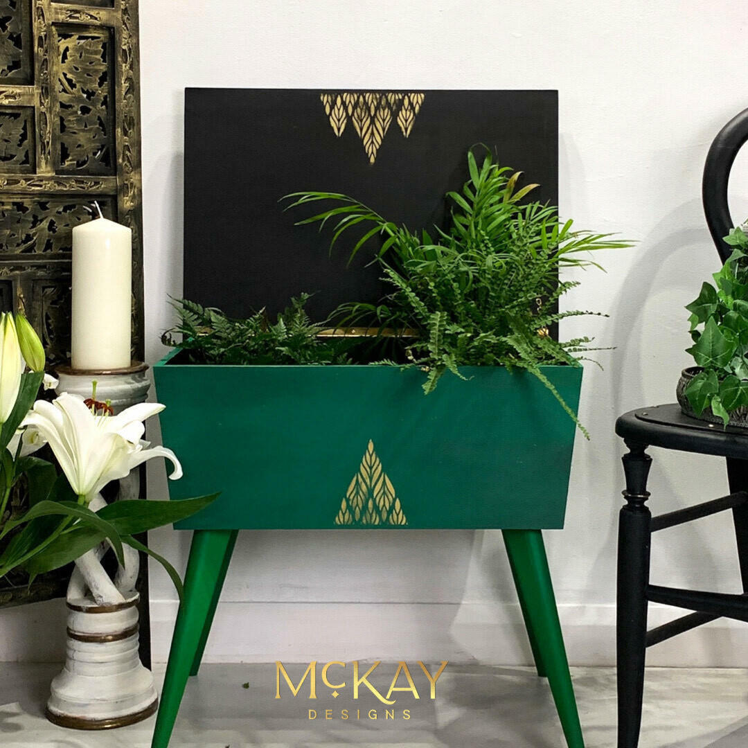 Belles and Whistles Botanical - Silkscreen Stencil provides an extra decorative touch to any project!
Vintage sewing box painted in Tree Frog Green Chalk Mineral Paint with Best Dang Wax! in Black to tone it down along with Anchor in the Silk All-in-One Paint on the inside of the piece. Botanical - Silkscreen Stencil is seen on the center of the piece in a gold paint as well as on the inside of the top. Staged with greenery on the inside and the outside, as well as a candle pedestal with a white candle.