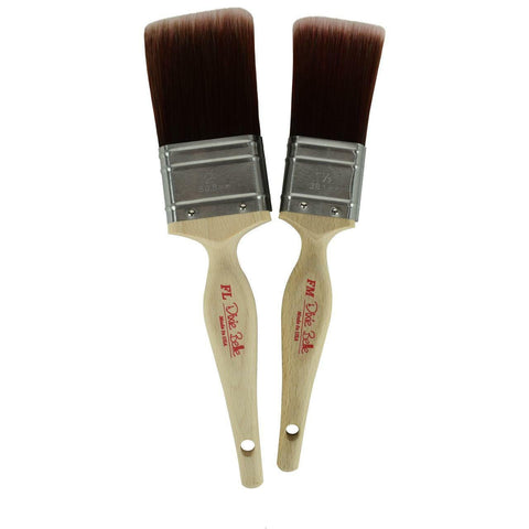 Belles and Whistles DBP Synthetic Brushes. A closeup product image displaying the Flat Large (FL) and Flat Medium (FM) synthetic brushes on a transparent background.