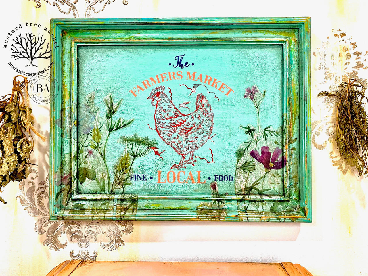 Belles and Whistles Farmhouse - Silkscreen Stencil provides an extra decorative touch to any project! Green picture frame with The Farmers Market, chicken, and Fine Local Food Silkscreen design applied in blue, orange and red.