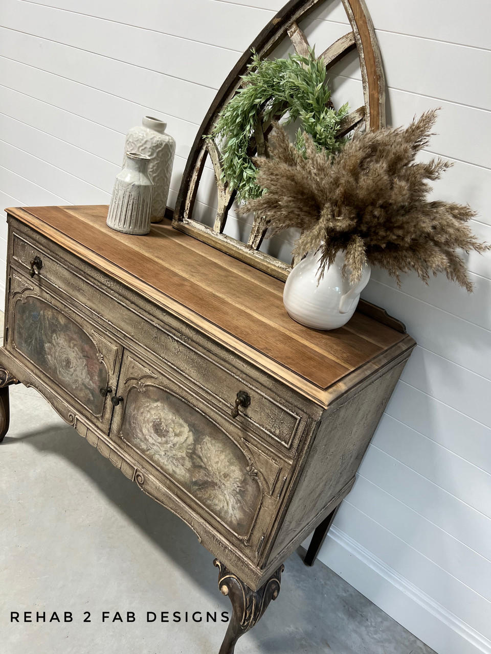 Belles and Whistles Floral Ballerina - A1 Rice Decoupage Paper is a simple way to visually enhance any surface of your project!
Console table with natural wood top  and a tan body with Floral Ballerina - A1 Rice Decoupage Paper  on the door panels. Staged on top of piece are Porcelain vase and bottles.