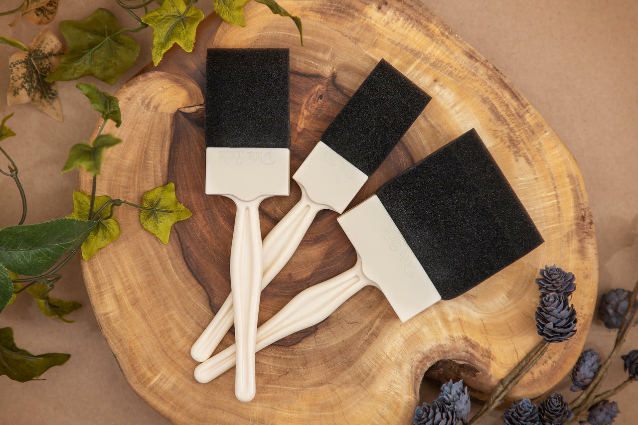 Belles and Whistles Foam N Dandy If you need a smooth as glass finish look no further, our thicker high quality foam brush is specifically designed to hold more paint for better coverage with a flawless finish.  A stylized picture of our three sizes of foam brush.