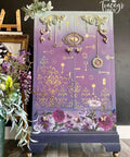 Large purple painted armoire with gold butterfly handles and accents. Buds & Branches Transfer applied on the bottom drawer. Royal Damask stencil applied in gold above the Transfer. Above the the Royal Damask stencil design, the Key to Success Stencil has been applied throughout the face of the armoire in gold.