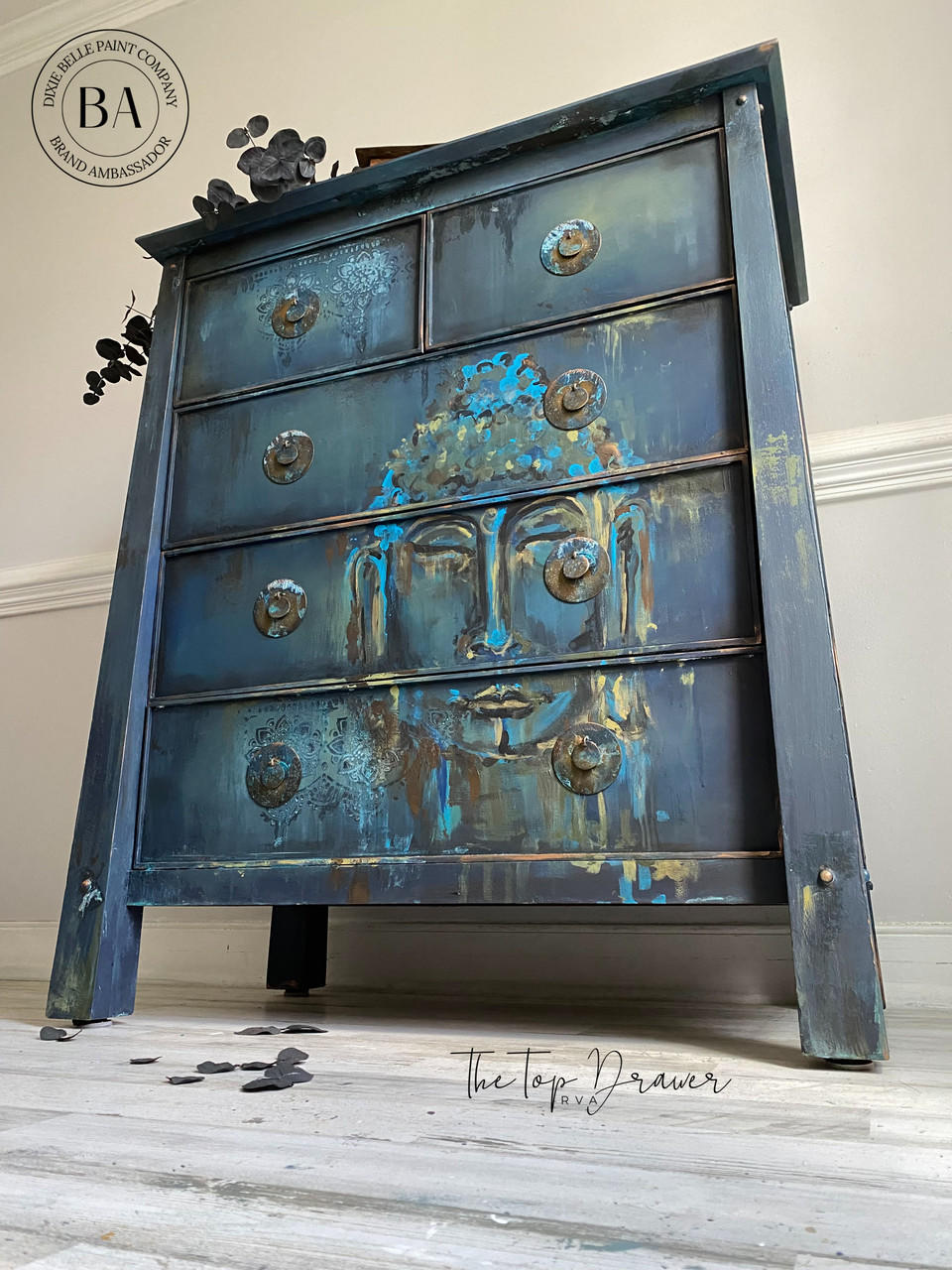 Belles and Whistles Lotus Bloom - Stencil provides an extra decorative touch to any project! 
Black dresser with hand painted buddha and Lotus Bloom - Stencil used lightly on last drawer and first drawer.