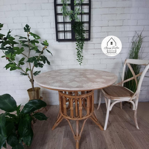 Belles and Whistles Mandala - Silkscreen Stencil provides an extra decorative touch to any project! Boho Table top with Chalk Mineral Painted Mandala Stencils on top. Staged with a Boho style matching chair and some plants.