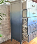 Belles and Whistles Morocco - Stencil provides an extra decorative touch to any project! Ombre Blue Chalk painted dresser with white painted morocco stencil painted on the side of the drawers.
