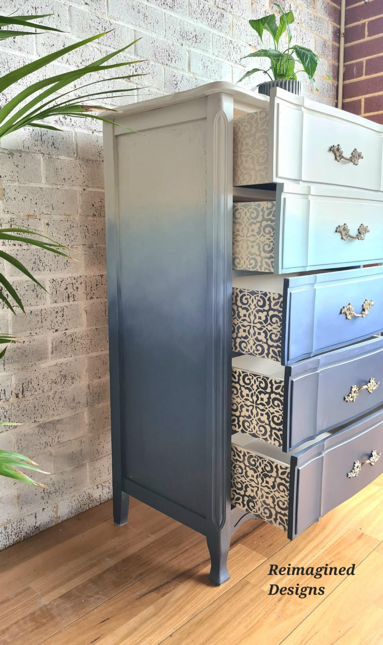 Belles and Whistles Morocco - Stencil provides an extra decorative touch to any project! Ombre Blue Chalk painted dresser with white painted morocco stencil painted on the side of the drawers.