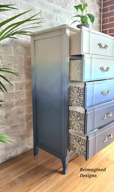 Belles and Whistles Morocco - Stencil provides an extra decorative touch to any project! Ombre Blue Chalk painted dresser with white painted morocco stencil painted on the side of the drawers.