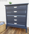 Belles and Whistles Patterns - Silkscreen Stencil provides an extra decorative touch to any project! Dark Blue chalk painted dresser with white hardware and Patterns stencil painted on.