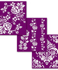 Belles and Whistles Roses - Silkscreen Stencil provides an extra decorative touch to any project! Shows an image of each silkscreen stencil in a full sheet. The first one has two designs mirroring each other with a single rose in the middle, leaves and vines on both sides with mini roses along it. The second shows roses and vines up and down. The third shows a damask design throughout.