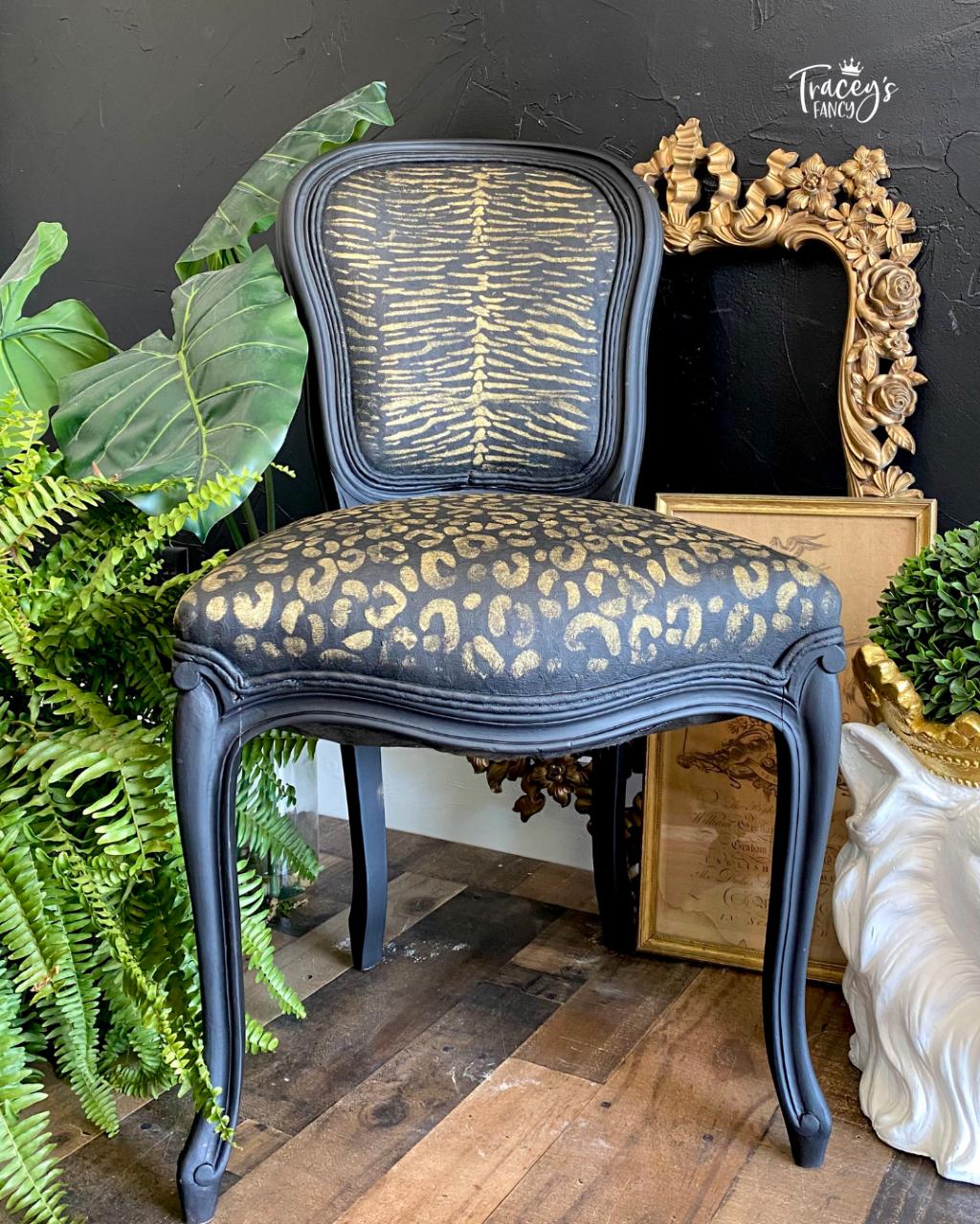 Belles and Whistles Safari - Stencil provides an extra decorative touch to any project! A black painted chair featuring the cheetah stencil on the seat part and the zebra stencil on the back of the chair, all in gold.