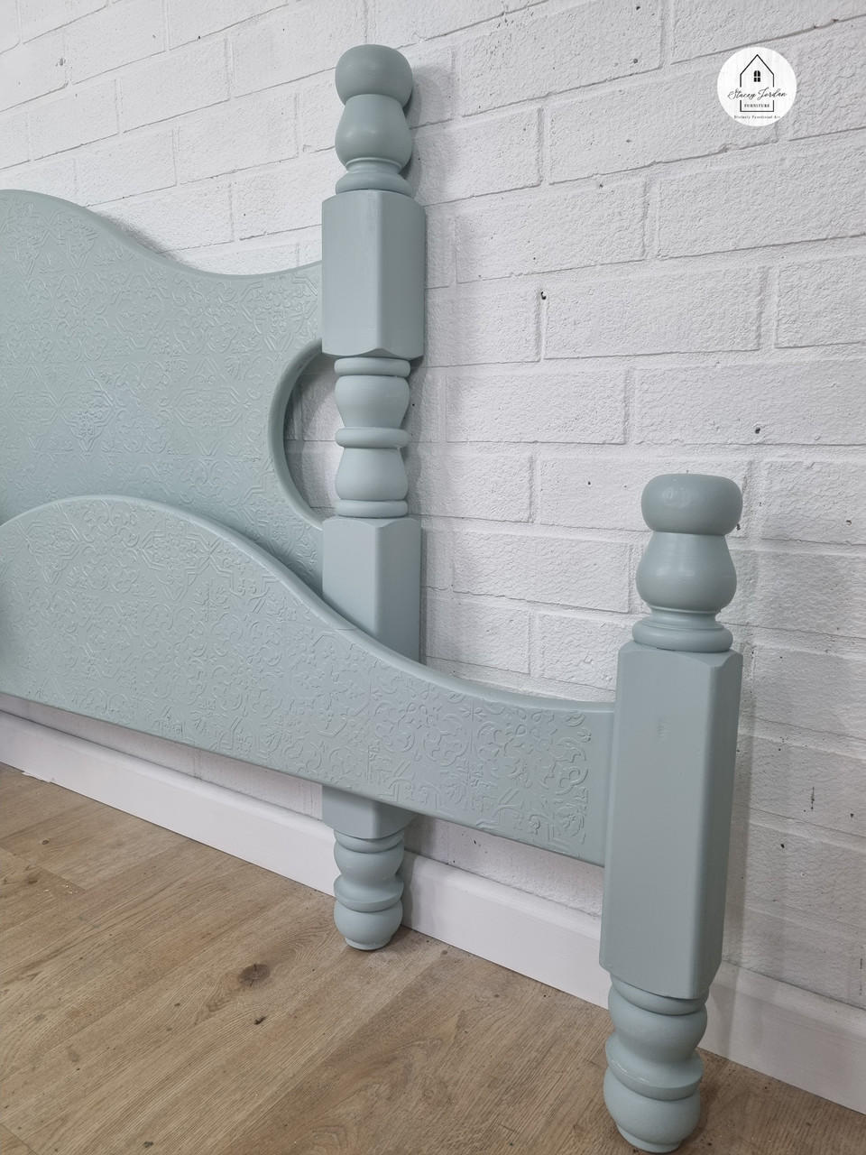 Belles and Whistles Sonoma Art Tile - Stencil provides an extra decorative touch to any project! A bed frame set painted in blue with the sonoma art tile stencil underneath as a raised stencil effect.