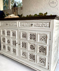 Belles and Whistles Sonoma Art Tile - Stencil provides an extra decorative touch to any project! A dresser painted in white with the sonoma art tile stencil featured on the front in brown.