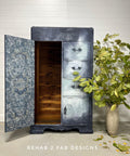 Belles and Whistles Sonoma Art Tile - Stencil provides an extra decorative touch to any project! A wardrobe painted in dark blue and then white blended in the middle as a highlight. This wardrobe features the sonoma art tile stencil inside the door in white.