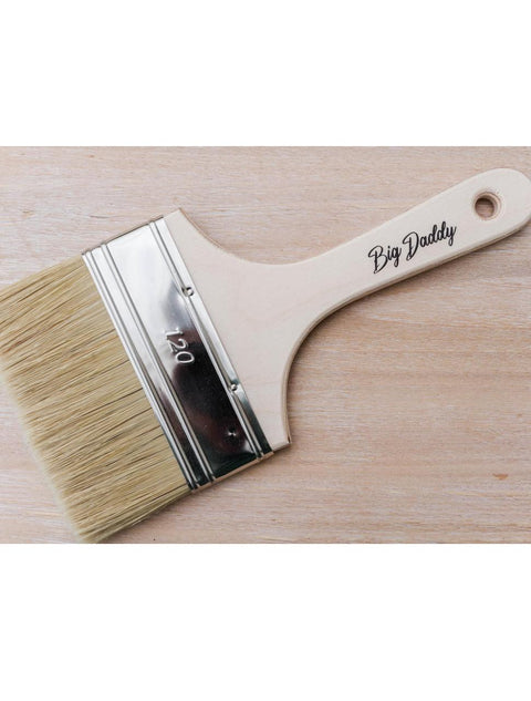 Belles and Whistles Big Daddy Brush. The Big Daddy Brush placed on a wooden background.