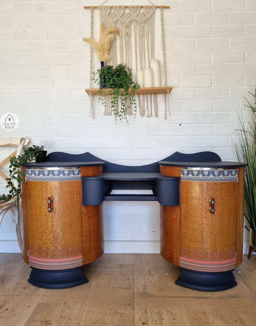 Navy blue painted and natural wood retro desk with two large cabinets on either end. The Bohemian Dream Transfer has been applied to the tops and bottoms of the cabinets.