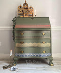 Green painted dresser with gold accents and 3 drawers. The Bohemian Dream Transfer has been applied to the bottom of each drawer and the top of the 1st drawer.