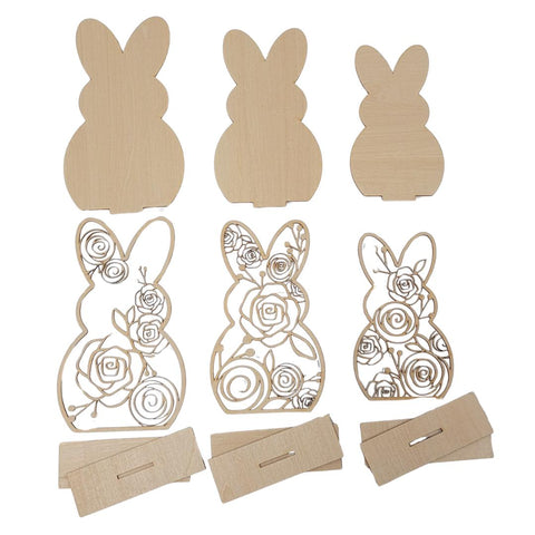 Wooden cutout pieces in the shapes of bunnies, with some featuring intricate floral designs. The set includes both solid and patterned pieces, along with rectangular bases for assembly.