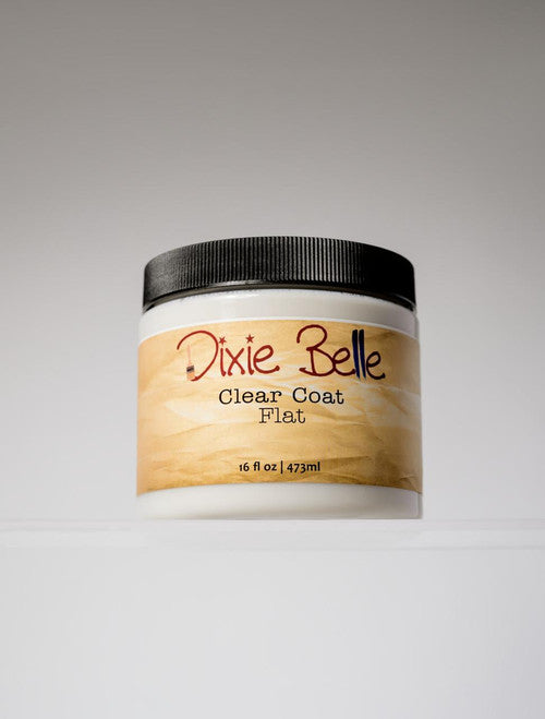 A 16 fl oz (473 ml) jar of Dixie Belle Clear Coat Flat with a black lid and a beige label, displayed against a plain light background.