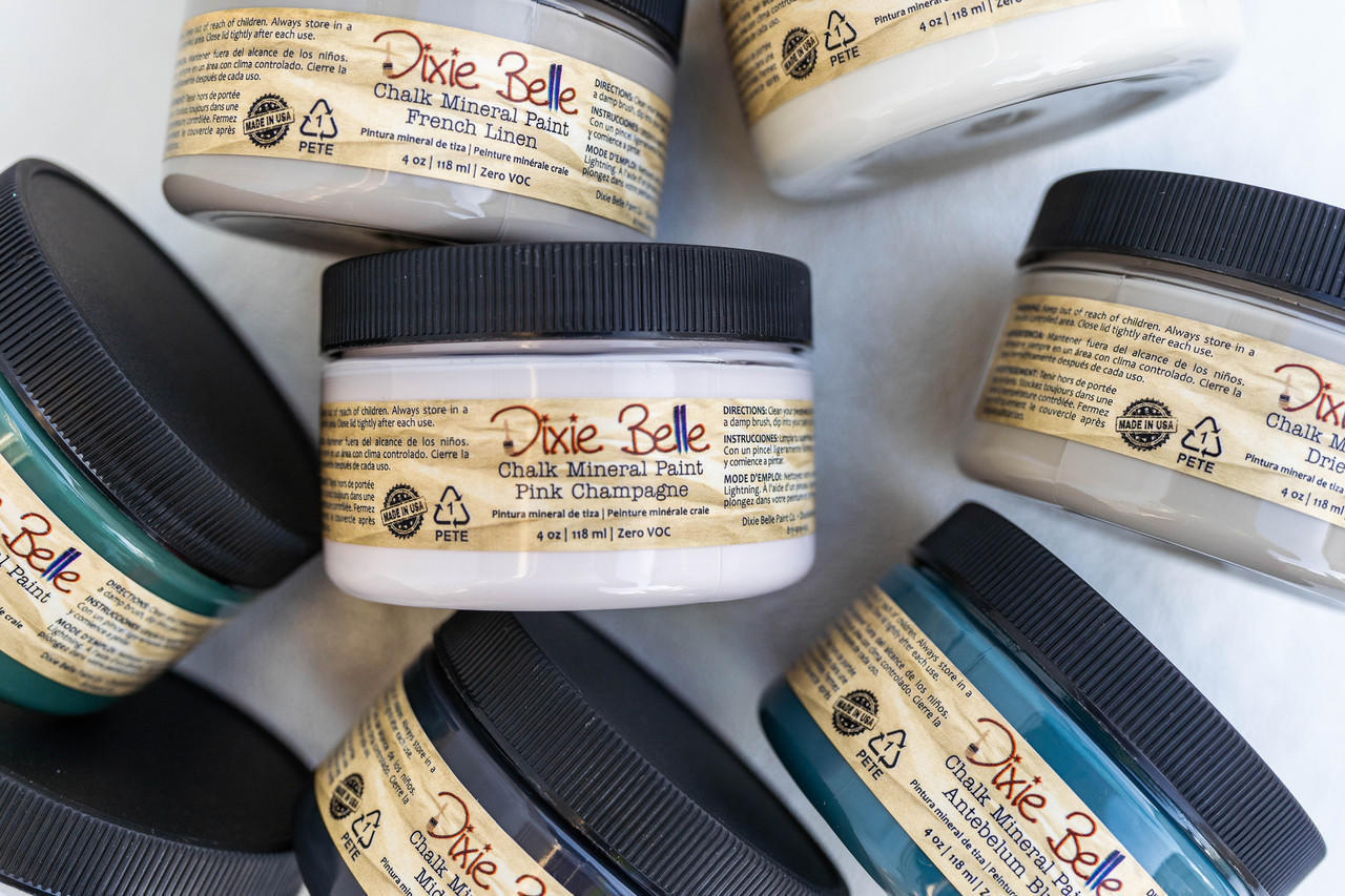 Dixie Belle Paint 4 oz All 64 Colors - Package - Various 4oz Dixie Belle Chalk Mineral Paints against a white background.