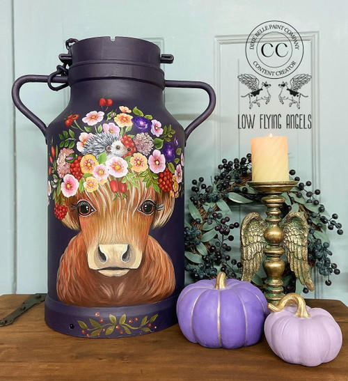 Dixie Belle Paint Amethyst Chalk Mineral Paint is the perfect paint for any DIY project! Classic milk jug painted with a base of Amethyst Chalk mineral Paint staged with faux pumpkins painted in the same color and candlestick.