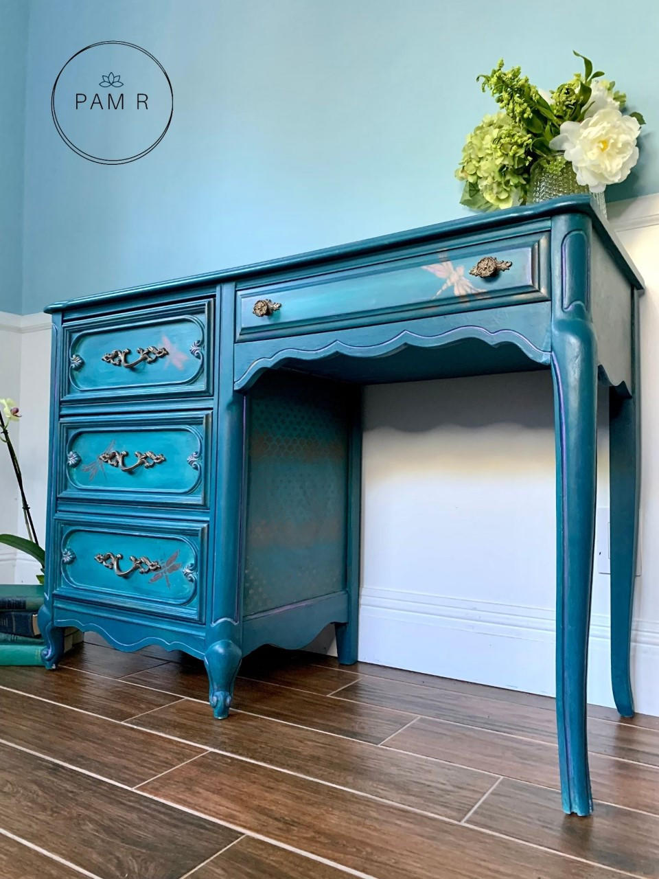 Dixie Belle Paint Antebellum Blue Chalk Mineral Paint is the perfect paint for any DIY project! Desk painted with Antebellum Blue Chalk Mineral Paint and stenciled with pink dragonflies.