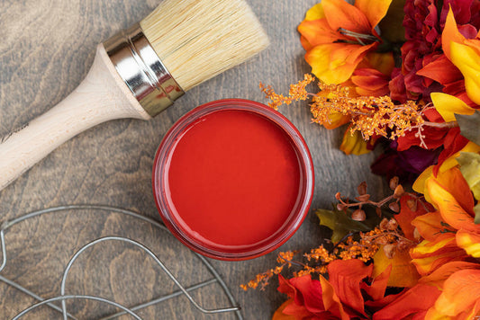 Dixie Belle Paint Barn Red Chalk Mineral Paint is the perfect paint for any DIY project! View of open container of Red chalk paint with a natural bristle brush which is the best brush for chalk paint.