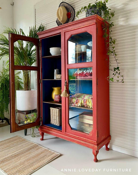 Dixie Belle Paint Barn Red Chalk Mineral Paint is the perfect paint for any DIY project! Red chalk painted cupboard or cabinet with glass doors.