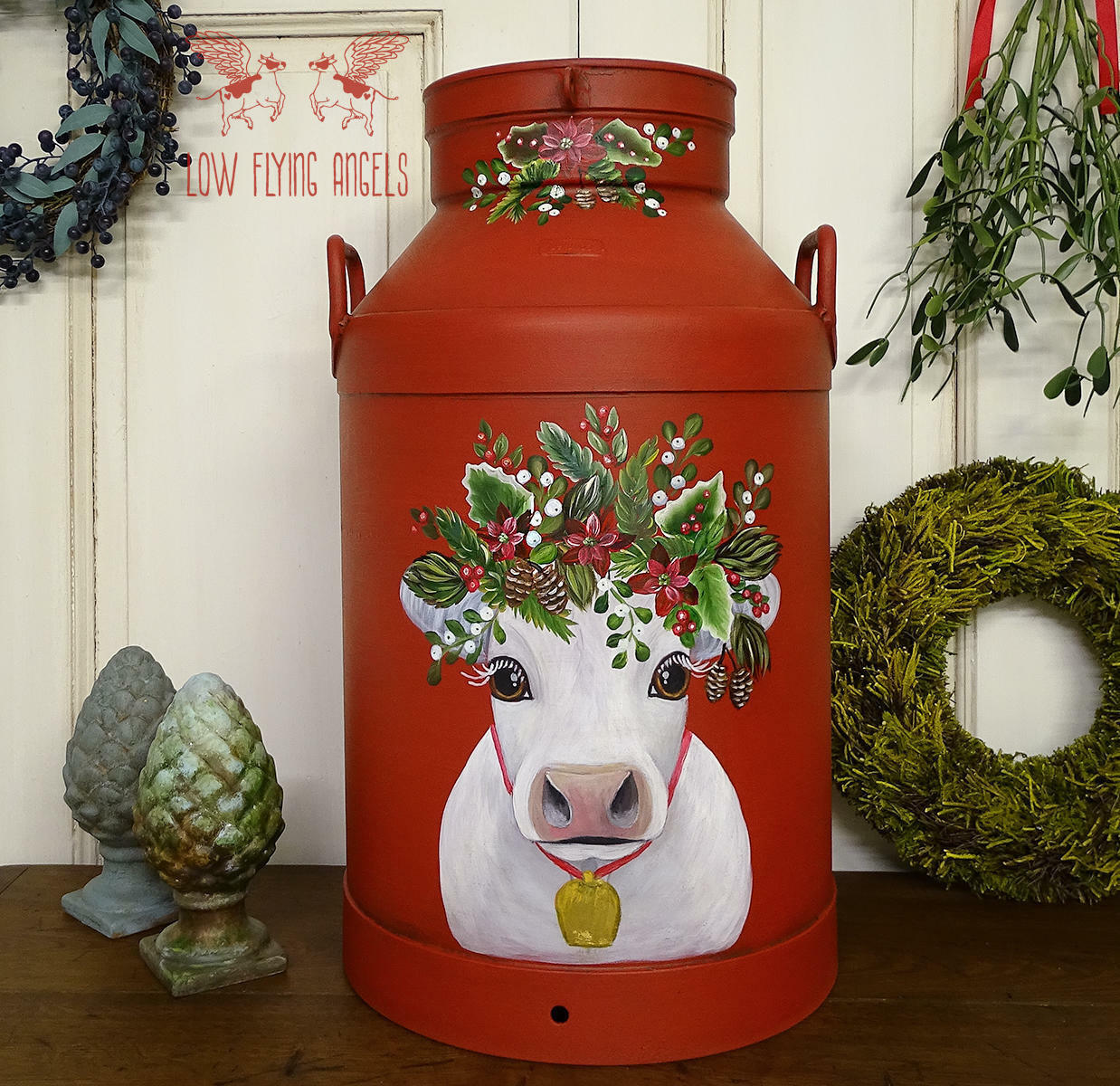 Dixie Belle Paint Barn Red Chalk Mineral Paint is the perfect paint for any DIY project! Red chalk painted tin milk canister with handles. A chalk painted white cow with a floral head piece was chalk painted on the milk canister as well.