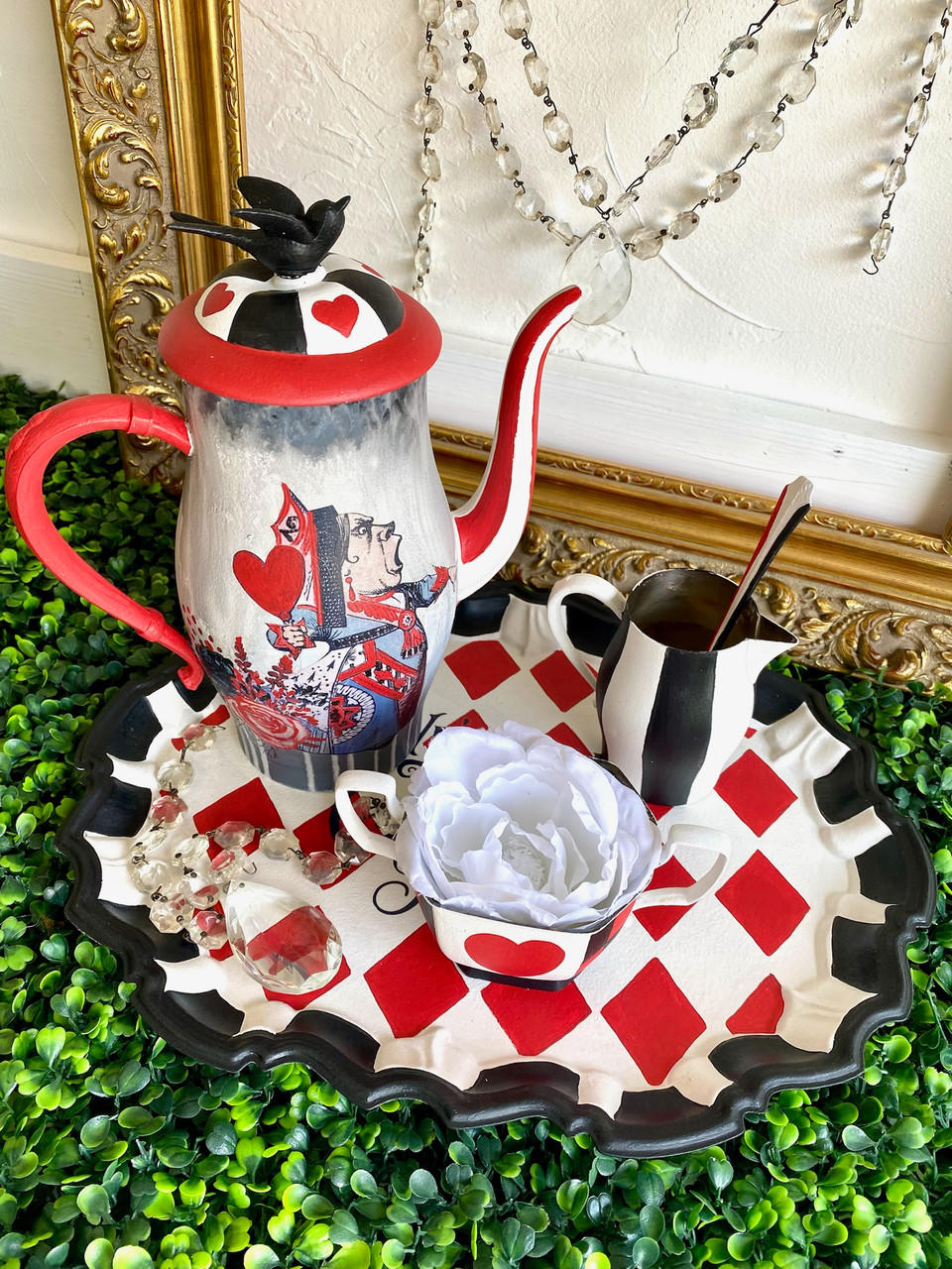 Dixie Belle Paint Barn Red Chalk Mineral Paint is the perfect paint for any DIY project! Chalk painted Metal tea pitcher and chalk painted metal tray with chalk painted metal sugar and creamer. Painted with a whimsical flare, black chalk paint with red and white chalk painted squares. Also, Alice Rub on Furniture Transfers was applied to the chalk painted tea pitcher.