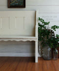Dixie Belle Paint Buttercream Chalk Mineral Paint is the perfect paint for any DIY project!
Entryway bench painted in Buttercream Chalk Mineral Paint staged with clear glass jars with greenery on the right side.
