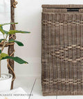 Dixie Belle Paint Chocolate Chalk Mineral Paint is the perfect paint for any DIY project!
A rattan laundry basket painted in Chocolate Chalk Mineral Paint. Staged with potted plant besides the piece.