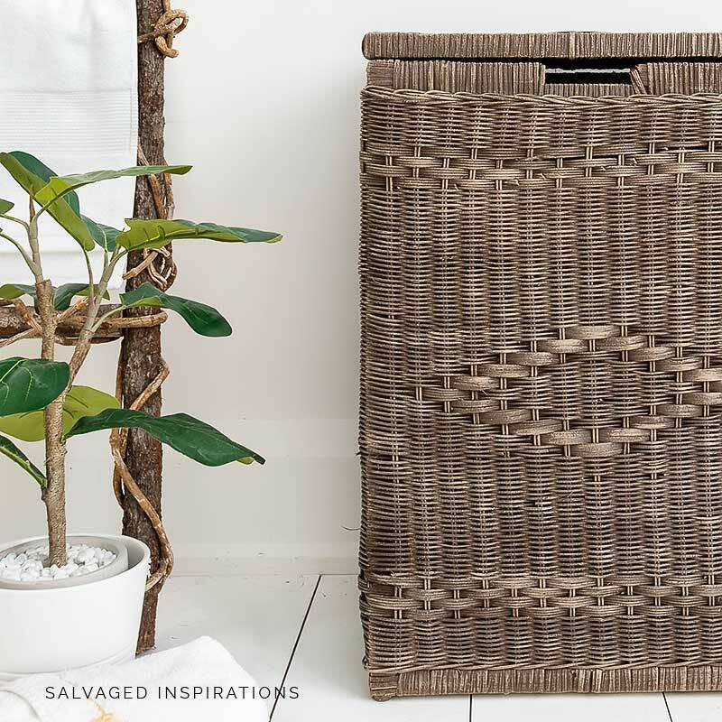 Dixie Belle Paint Chocolate Chalk Mineral Paint is the perfect paint for any DIY project!
A rattan laundry basket painted in Chocolate Chalk Mineral Paint. Staged with potted plant besides the piece.