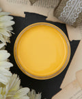 Dixie Belle Paint Daisy Chalk Mineral Paint is the perfect paint for any DIY project! A product image of an open paint can displaying the color daisy.