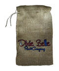 Dixie Belle Paint DBP Burlap Bags. A product image of the front of the burlap bags showing the DBP logo on a transparent background.