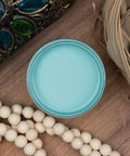 Dixie Belle Paint Dixie Belle Blue Chalk Mineral Paint is the perfect paint for any DIY project!
You are looking straight down on the Dixie Belle Blue CMP container so you are looking directly at the paint since the top is off.  It is staged with white, wooden beads, a jeweled glass, metal box and a wicker basket.  It all rests on a wooden, maple plank.
